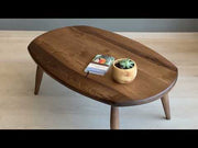 Product video showcasing the full aesthetic appeal and functionality of the Solid Walnut Wood Oval Coffee Table.