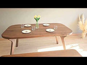 Dynamic footage showcasing the dining table solid wood multiple angles, emphasizing its elegant design, durability, and suitability for both modern and rustic interiors.