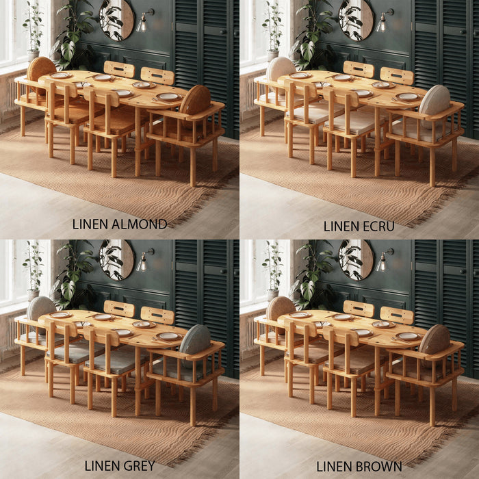 Beverly Hills oval dining table set styled in a modern dining room, with minimalist decor and elegant lighting accentuating the set.