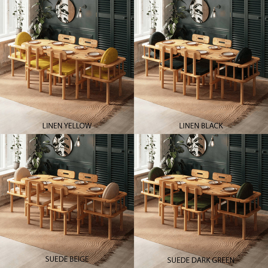 The Beverly Hills oval dining table set as the centerpiece of a contemporary dining room, complemented by chic decor and stylish chairs