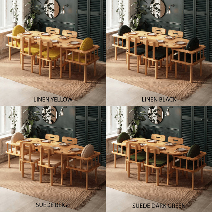 The Beverly Hills oval dining table set as the centerpiece of a contemporary dining room, complemented by chic decor and stylish chairs