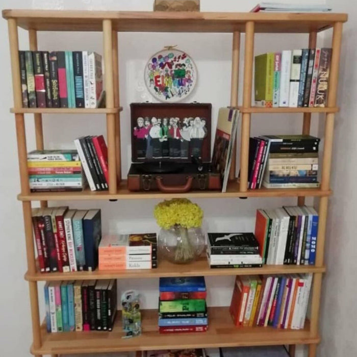 Complete view of the Brooklyn bookcase solid wood in a stylish living space, showing its elegant and functional design.