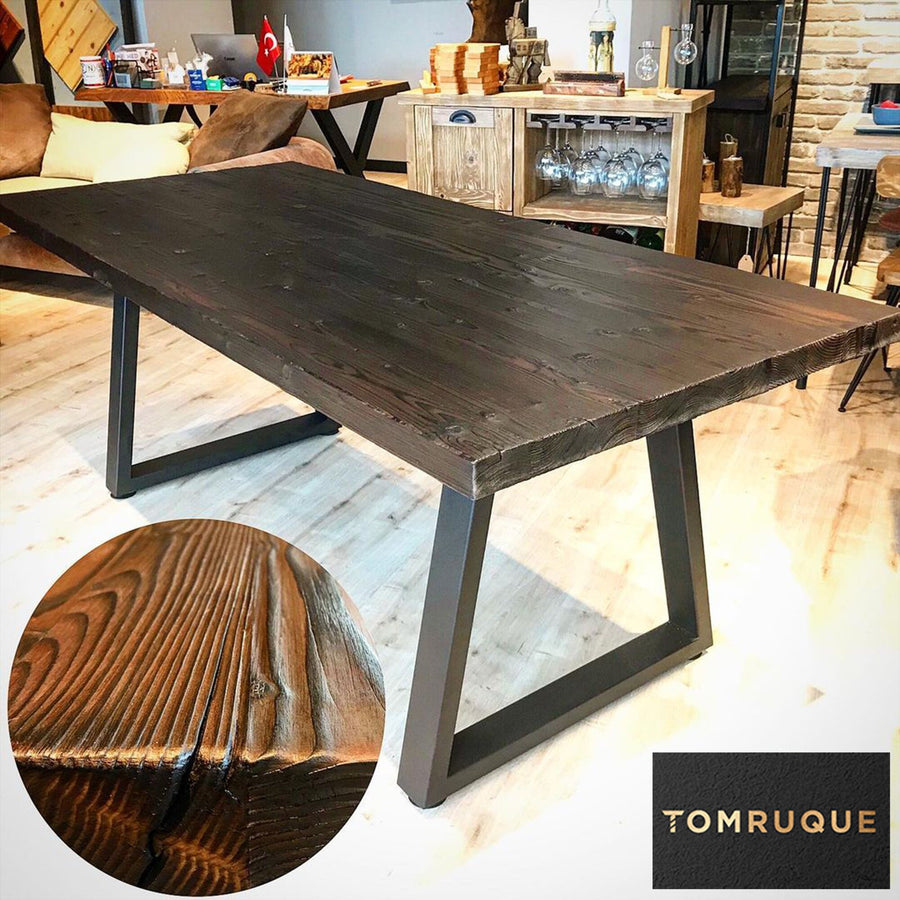 Cary Table set with tableware and decor in a cozy, farmhouse-style dining room.