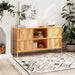 A wide view of the Compton wood dining sideboard buffet showcasing its spacious surface and clean, minimalist design with natural wood grain visible.