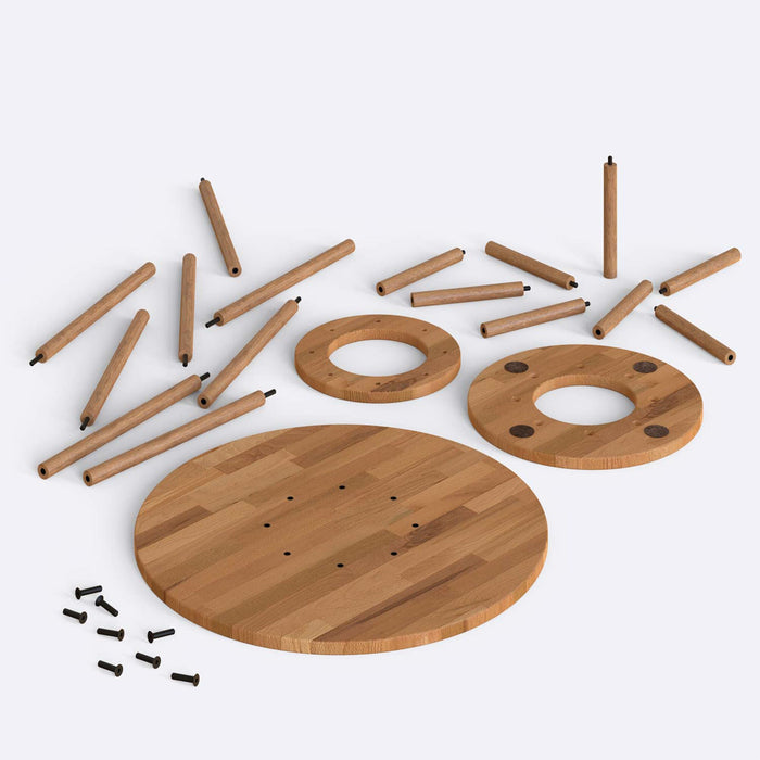 A top-down view of the Grant table, focusing on the circular beech wood top, ideal for two people.