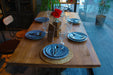 Close-up of the natural pine wood grain on the Harley Farmhouse Dining Table, emphasizing its quality craftsmanshi