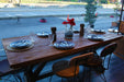 Dining Table paired with chairs, ideal for family dinners in a cozy farmhouse setting.