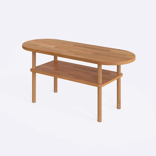 Close-up of the table’s elegant oval shape, highlighting the fine craftsmanship of the beech wood surface.