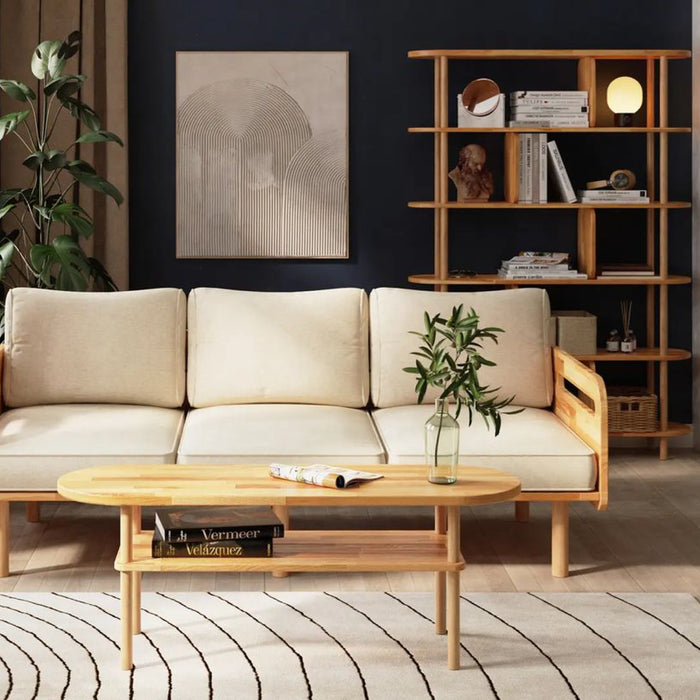  The Kennard coffee table paired with other modern furniture in a spacious living room, illustrating its versatile design.