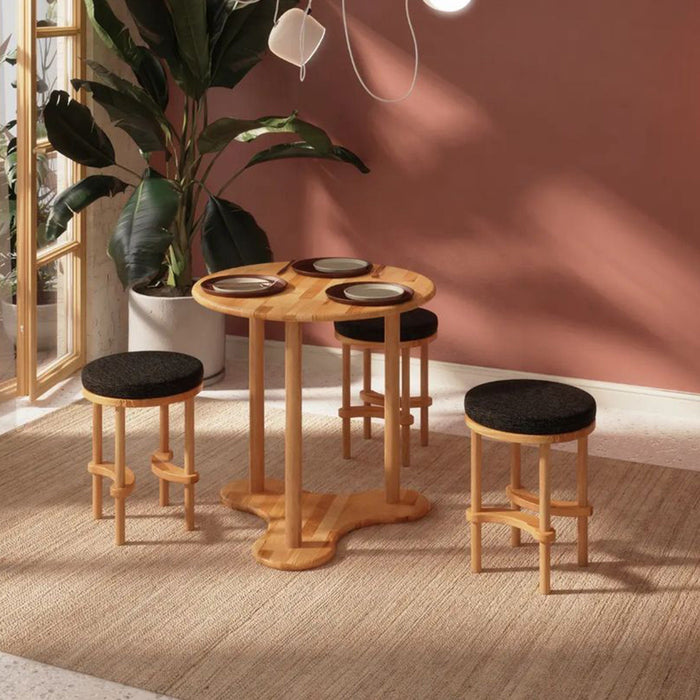 Close-up of the beech wood texture and natural finish on the table's surface.
