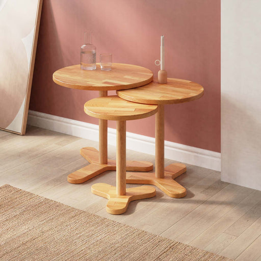 Front view of Lynn Wood Round Side Coffee Table Set featuring three varying sizes of minimalist round tables with natural wood finish.