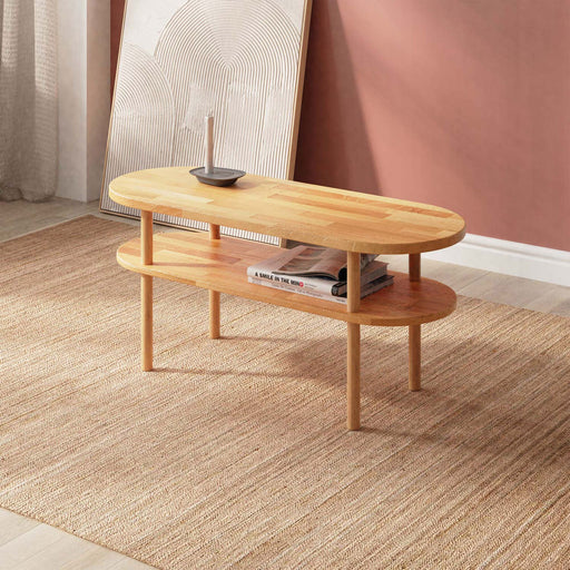 Malibu Beech wooden oval coffee table with minimalist design and smooth finish.