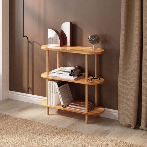 Side view of the Malibu Living Room Bookshelf showcasing its three spacious wooden shelves and minimalist design.