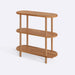 Close-up of the smooth wooden surface of the Malibu bookshelf, highlighting its natural grain and quality finish.