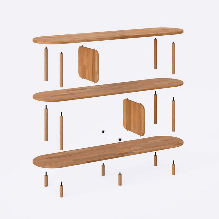 Close-up of one of the open shelves of the Malibu Low Bookcase, emphasizing the natural wood grain.