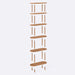 Bookcase styled with books and decorative items, demonstrating its functionality as a tall narrow bookcase for storage and display.