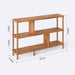 The 3 shelf bookcase seamlessly integrates into a cozy living room, holding books and decorative items.