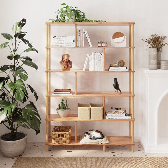 Books and décor displayed on the Manhattan Solid Wood Bookcase – A modern bookcase styled with books and decorative items, showcasing its functionality and aesthetic appeal.