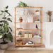 Books and décor displayed on the Manhattan Solid Wood Bookcase – A modern bookcase styled with books and decorative items, showcasing its functionality and aesthetic appeal.