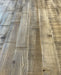 Warm, rustic tones of the Montpelier Pine hardwood dining table with a robust trestle base.