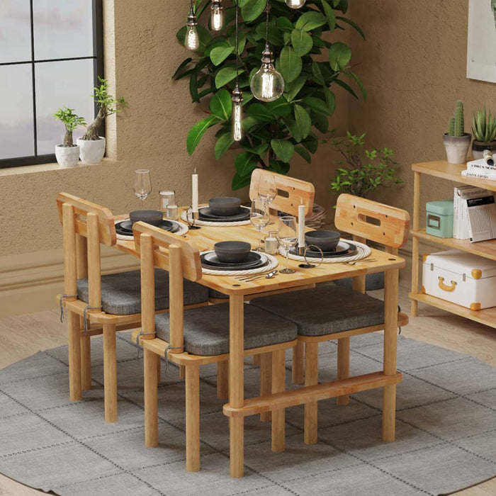 A spacious rectangle dining table surrounded by matching wooden chairs, creating a harmonious, modern dining setup for four.