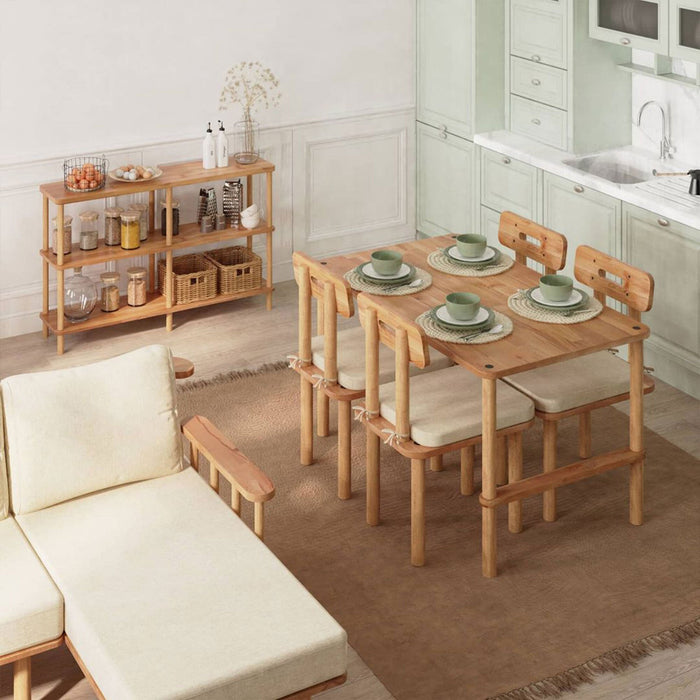 Side angle of the dining table with a minimalist design, offering ample space for four people in a sleek dining area.