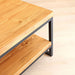 Side angle of the Portland Pine Wood Coffee Table, displaying its thick legs and solid pine wood design.