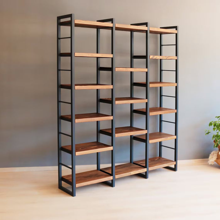 Portland Pine Room Divider Bookcase styled with books, plants, and decor, demonstrating its versatility in living spaces.