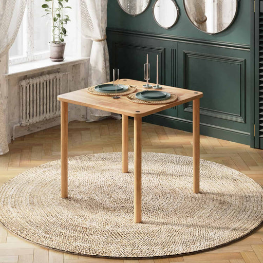 Soho Minimalist Dining Table in a sleek, square design with solid wood construction, showcasing its modern minimalist style in a bright, contemporary dining room.