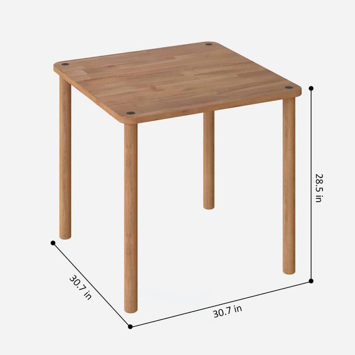 The Soho Minimalist Dining Table placed in a spacious dining room with minimalist décor, highlighting the table's solid wood craftsmanship and modern aesthetic