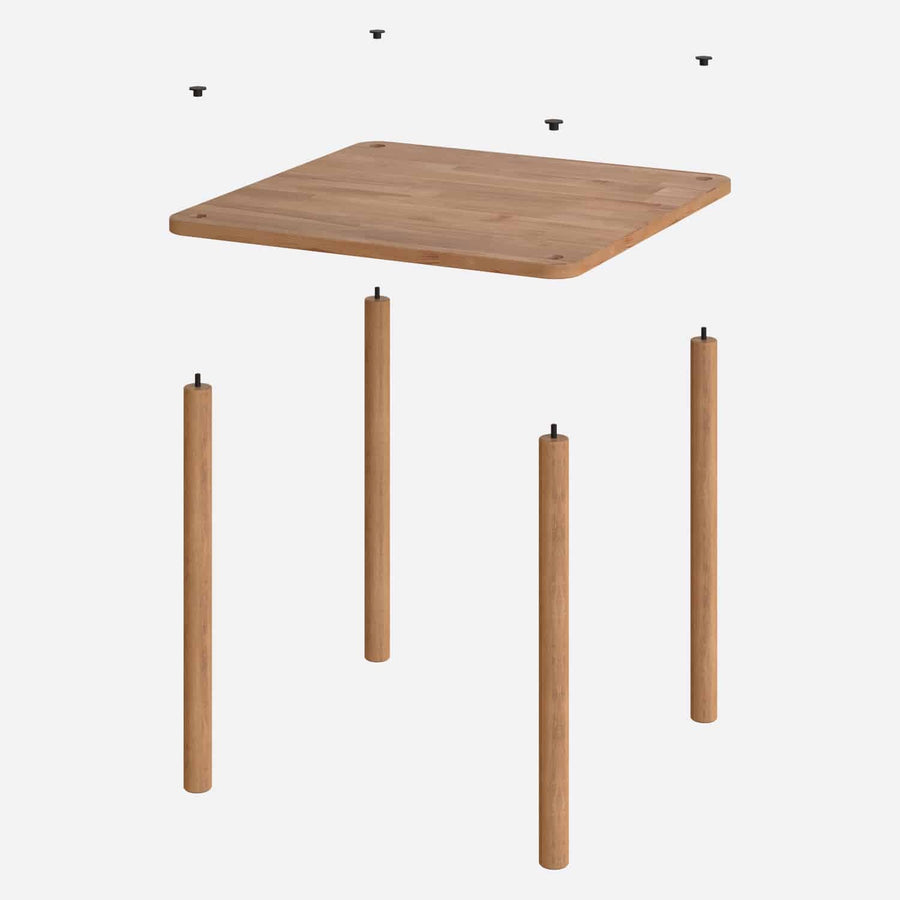 Side view of the Soho Minimalist Dining Table, showcasing its elegant square shape and solid wood material, perfect for a contemporary minimalist dining room