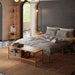  The round beech wood bookcase against a neutral background, illustrating its versatile design for various home settings.