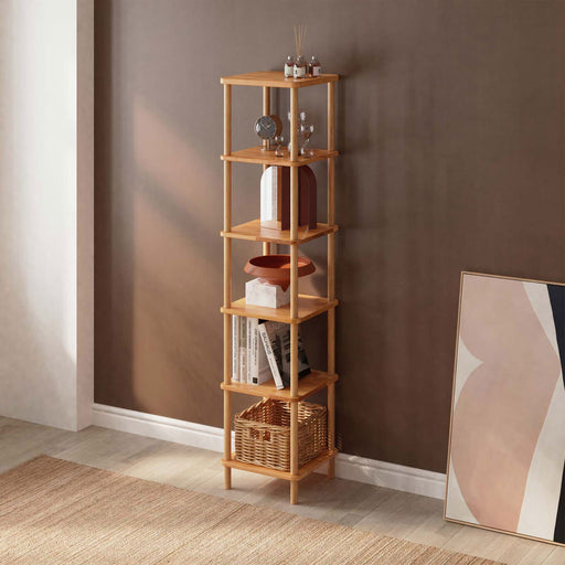 Front view of a minimalist Soho Tall Skinny Bookcase in natural beech wood finish, showcasing clean lines and a compact design.