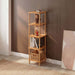Stylish Soho bookcase against a white wall, elegantly holding books and small decor pieces.