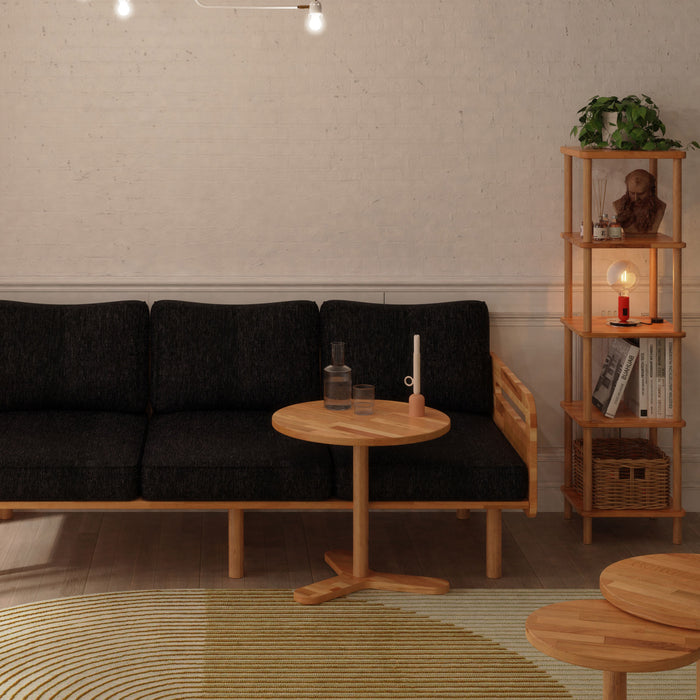 Soho bookcase in a narrow space, demonstrating its space-saving functionality and sleek appearance.