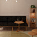 Soho bookcase in a narrow space, demonstrating its space-saving functionality and sleek appearance.