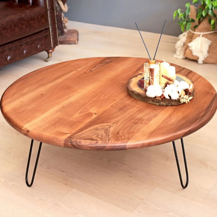 Side angle of the Spark Walnut Wood Coffee Table – A close-up showcasing the metal legs and how they complement the warm walnut wood.