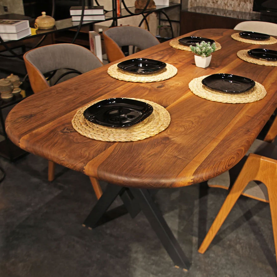 Top-down view of the Toledo wooden dining table, showing the spacious surface and sturdy metal legs.
