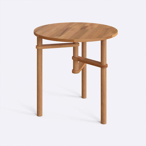 Side view of the modern small round table dining, showcasing its sturdy beech wood legs and seamless round top perfect for compact spaces