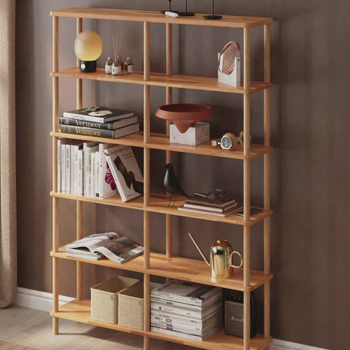 A 360-degree view of the Queens Natural Wood Bookcase, highlighting its tall, minimalist design, spacious shelves, and natural wood finish.